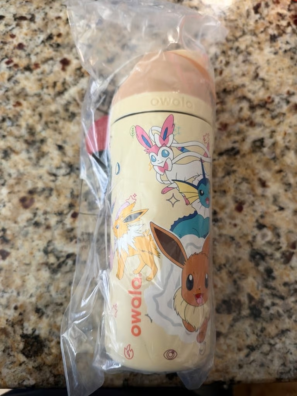 Pokemon Owala & Evolutions Cream Travel Bottle
